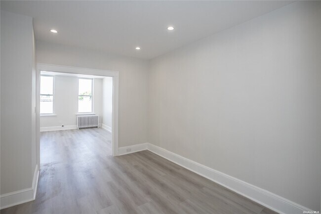 Building Photo - 67-17 Myrtle Ave