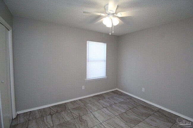 Building Photo - 6810 Tiki Ln