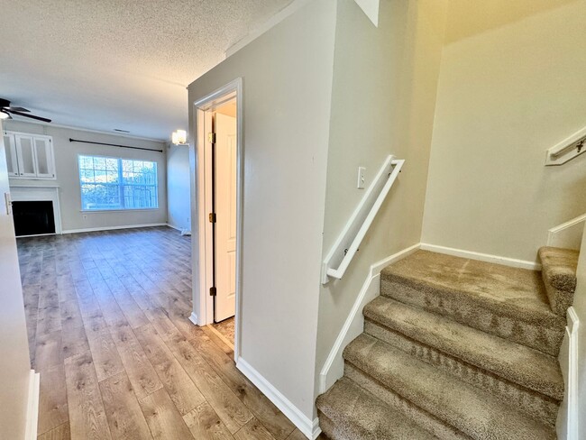 Building Photo - Ready NOW!! A 3-Bedroom Townhome w/Attache...