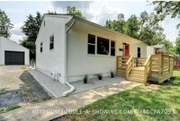 Building Photo - Welcome to Your Fully Renovated Retreat!