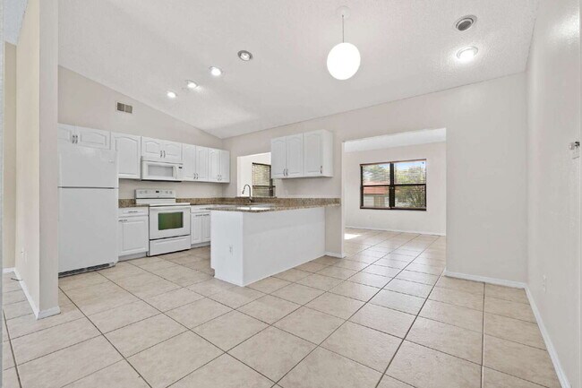 Building Photo - Comfort, Space & Convenience on a Peaceful Corner Lot in the Shores