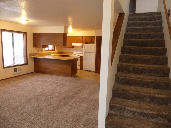 Building Photo - Wood Village End Unit Condo * Covered Park...