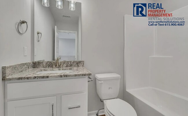 Building Photo - BRAND-NEW Stunning END-unit townhome in Manchester, attached garage!