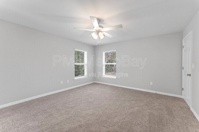 Building Photo - 9461 N Sandree Dr