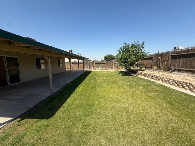 Building Photo - charming 3-bedroom, 2-bath home