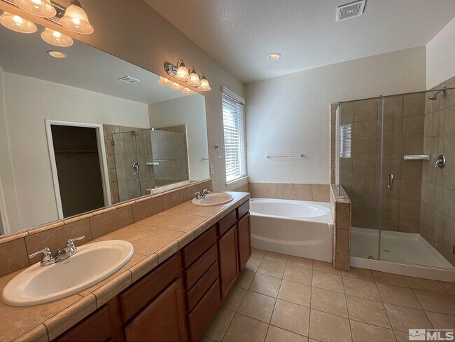 Building Photo - 7023 Cinder Village Dr
