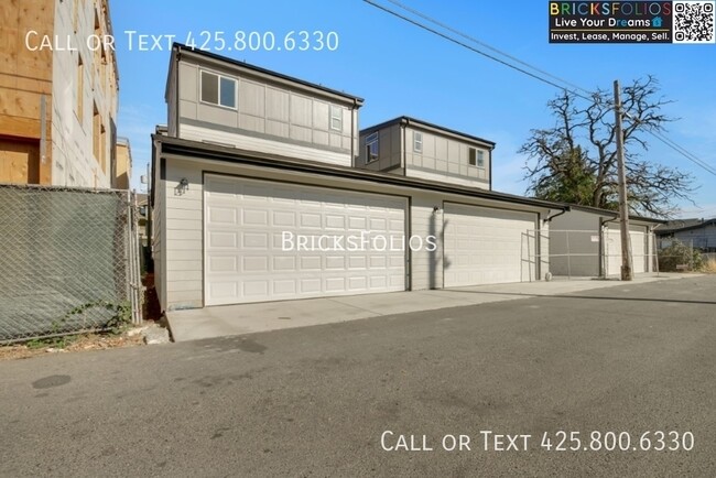 Building Photo - Near JBLM – Stylish, Comfortable, and Move...