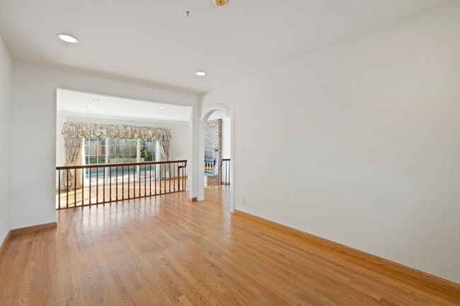 Building Photo - POOL PARADISE IN A COVETED NEIGHBORHOOD STYLISH UPGRADES | EXTREME CONVENIENCE