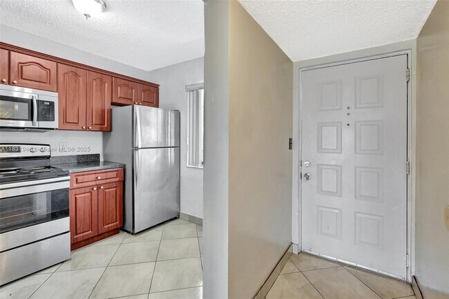 Building Photo - 8720 N Sherman Cir