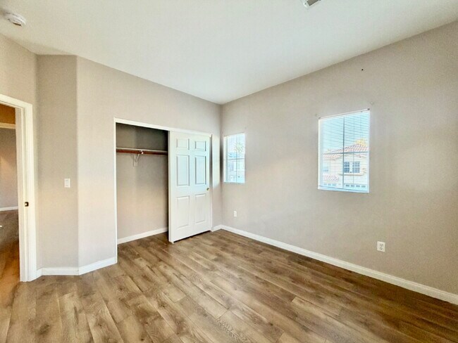 Building Photo - GATED SUMMERLIN HOME | 5 BEDROOM + DOWNSTAIRS DEN | 3-CAR GARAGE