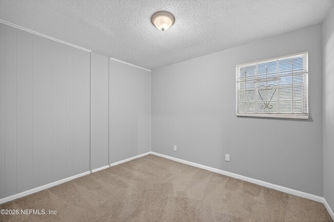 Building Photo - 6955 Miss Muffet Ln S