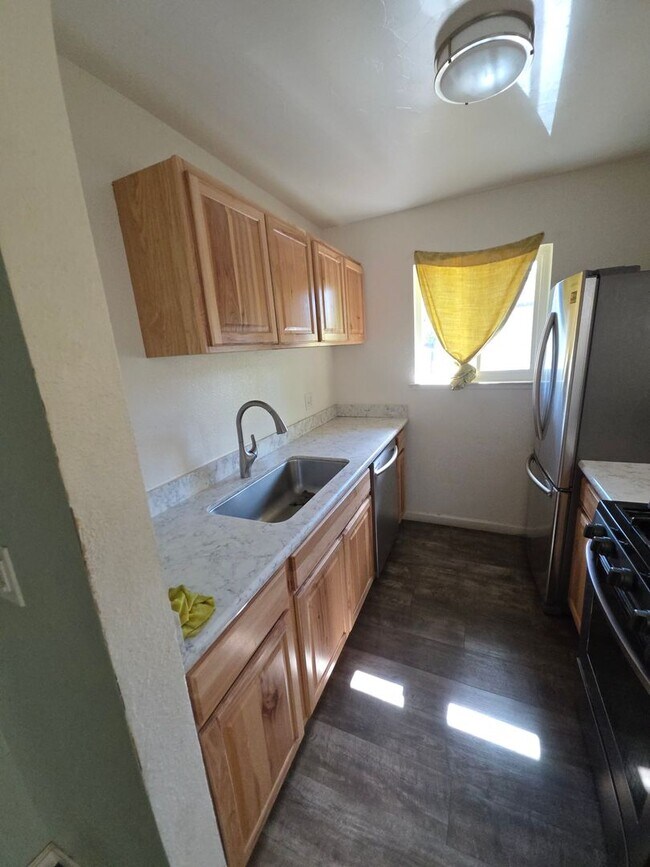 Building Photo - Welcome home to this beautifully updated 2-bedroom, 1-bath upstairs condo in a peaceful Auburn ne...