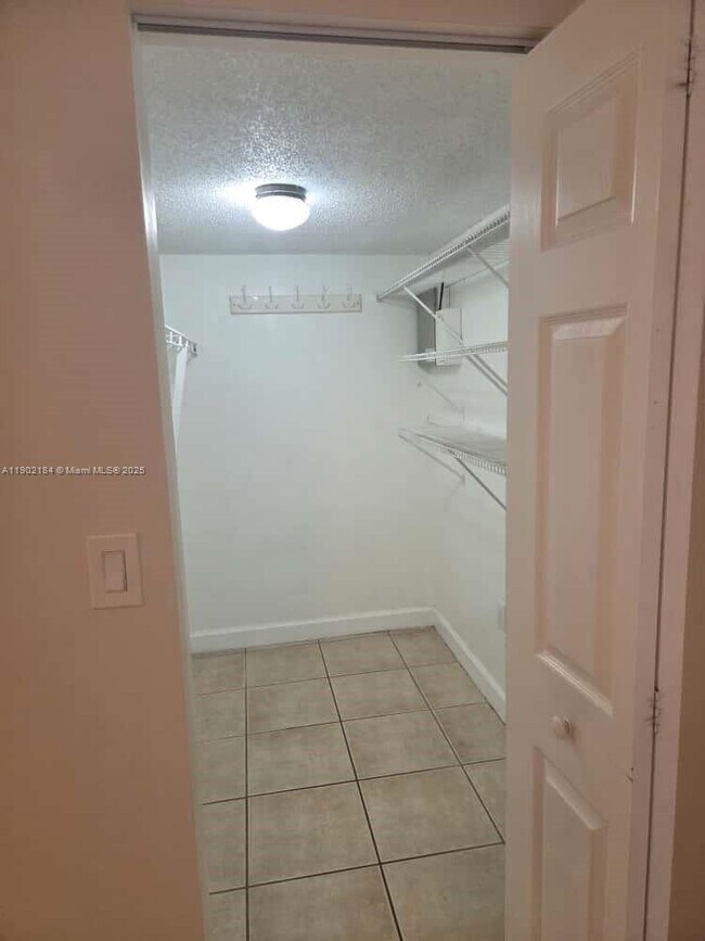 Building Photo - 7406 Woodmont Terrace