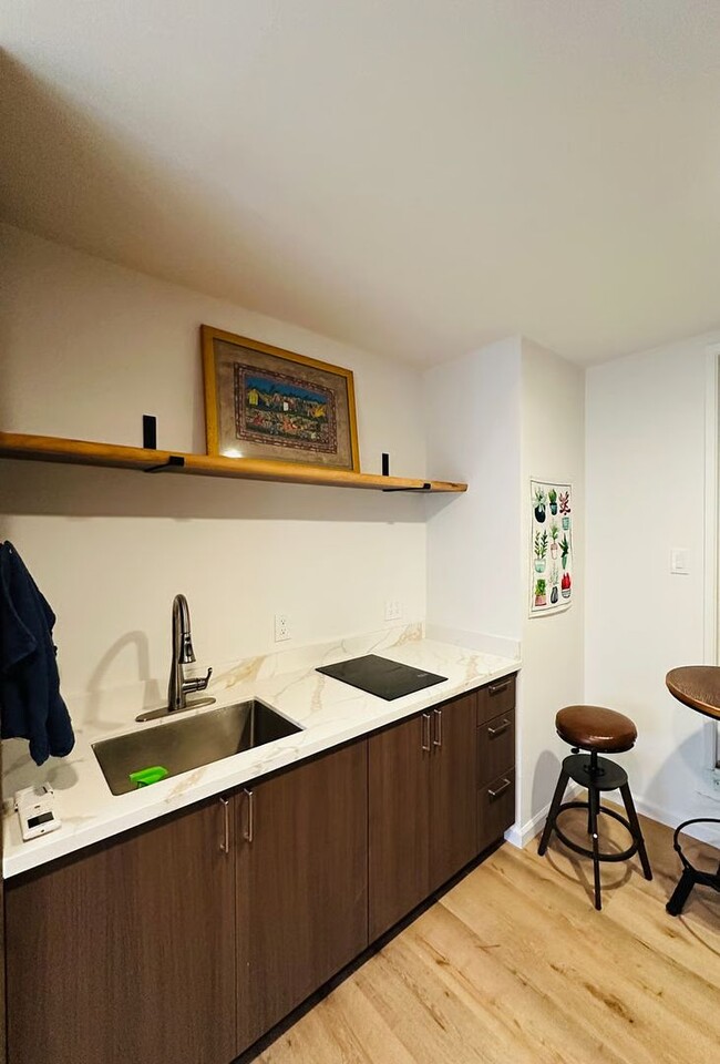 Building Photo - Peaceful, Fully Furnished Studio with Pati...