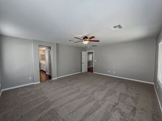 Building Photo - Stunning 5-Bedroom Home in Gated Community...