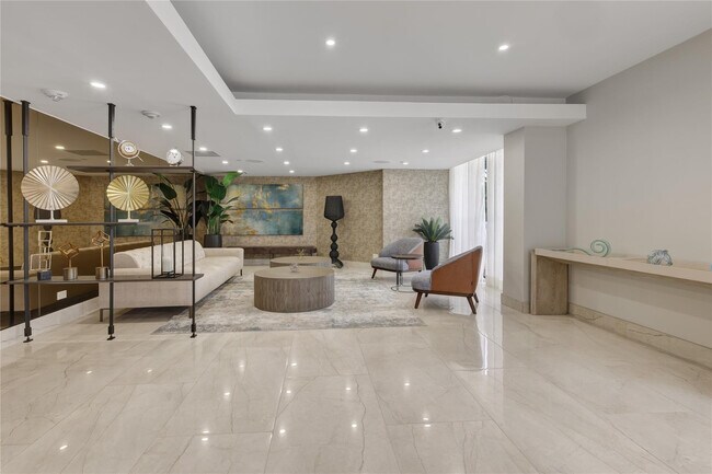 Building Photo - 20191 E Country Club Dr