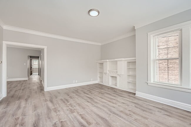 Building Photo - 7449 S Vernon Ave