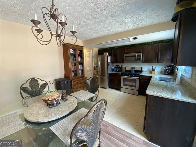 Building Photo - 1220 Kennesaw Trace Ct