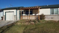 Building Photo - Bright 2 Bed, 1 Bath Home with Garage & Fenced Yard in Fort Collins