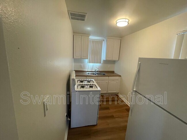 Building Photo - 9449 Normandie Ave