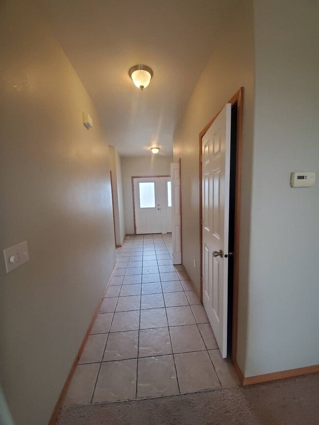 Building Photo - Triple Car Garage & New Interior Paint