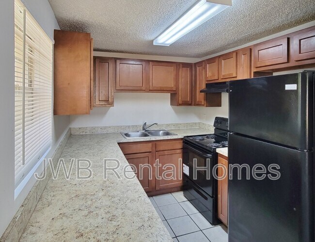 Building Photo - 7833 Eaton Ave