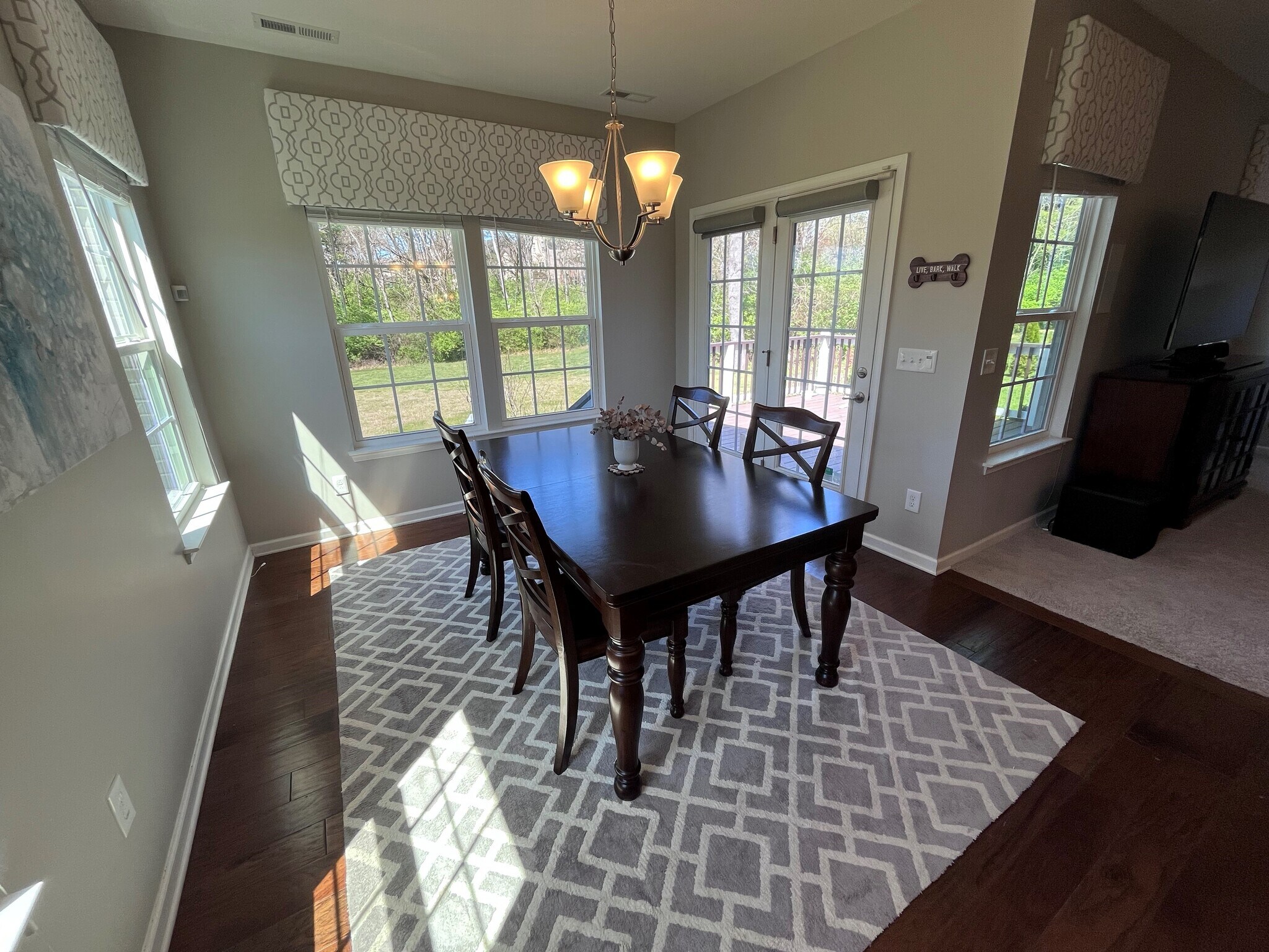 Enjoy beautiful views and step out onto the large deck to relax - 7736 Tranquil Trl