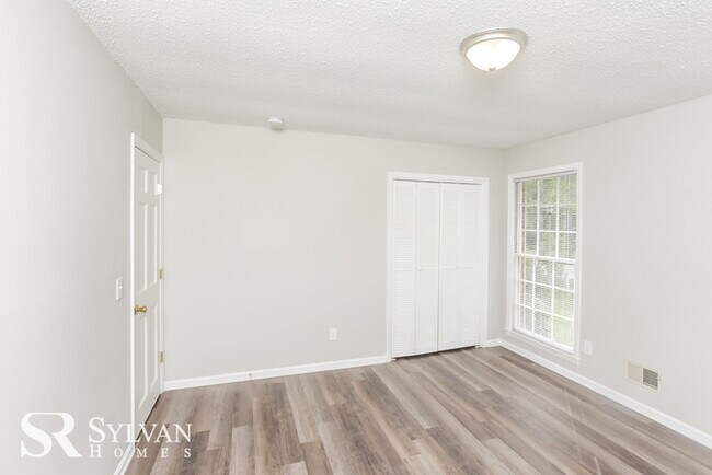 Building Photo - Come view this charming brick home