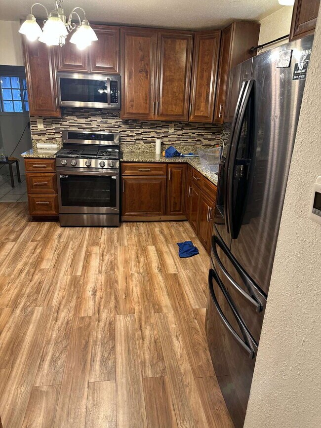 Building Photo - Classic Denver Home: 3 Beds, Updated Kitchen, Private Yard, Parking