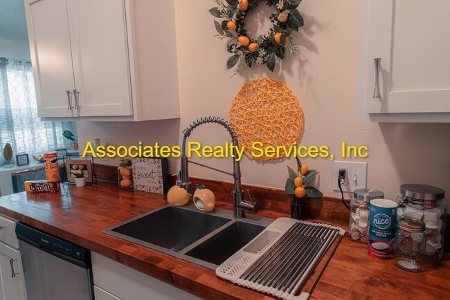 Building Photo - Beautifully furnished  2-Bedroom Duplex – ...