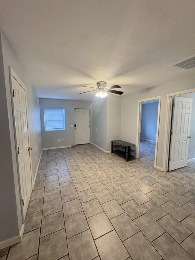 Building Photo - Open floor plan, four-bedroom two-bathroom with washer and dryer