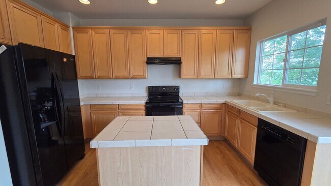 Building Photo - Spacious 5-Bedroom Home in Desirable Rock Creek – Fresh Updates & Fantastic Location!