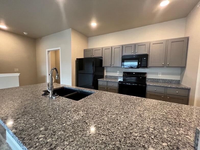 Photos are for finish reference; please see the floor plan for specific layout details. - Harbor Pointe