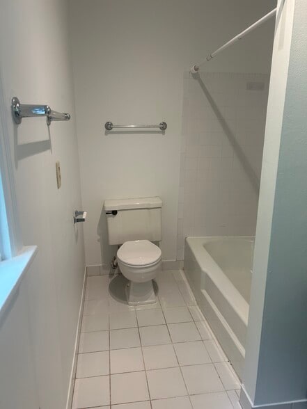 Bathroom with tile floor and shower/tub - 666 Mohawk St
