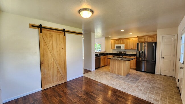Building Photo - Beautiful House with Yard and Pets Considered