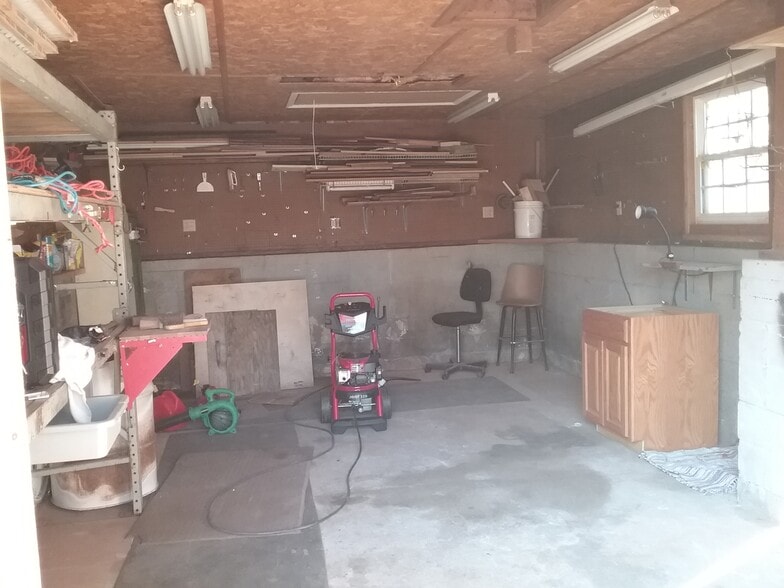 Large utility shed with electricity. Could be extra storage, a workshop, or a mancave or hobby haven - 701 Rosalyn Dr