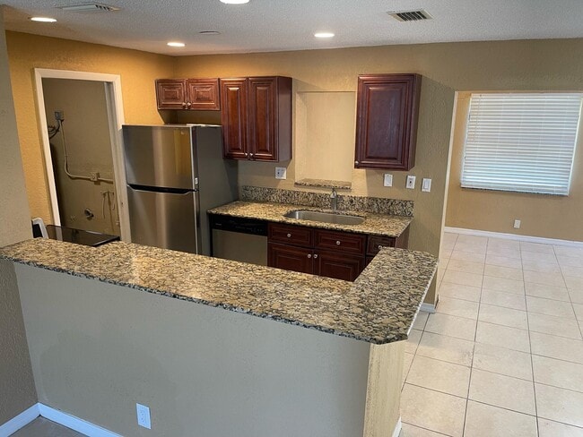 Building Photo - 1650 W 12th Ct