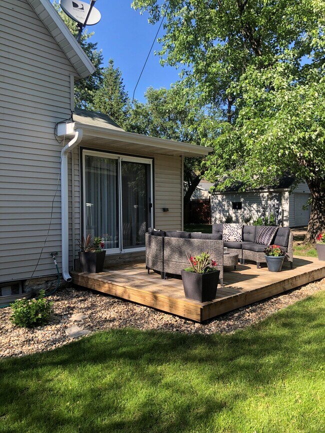 Deck that overlooks park & street scape. - 222 6th Ave SE