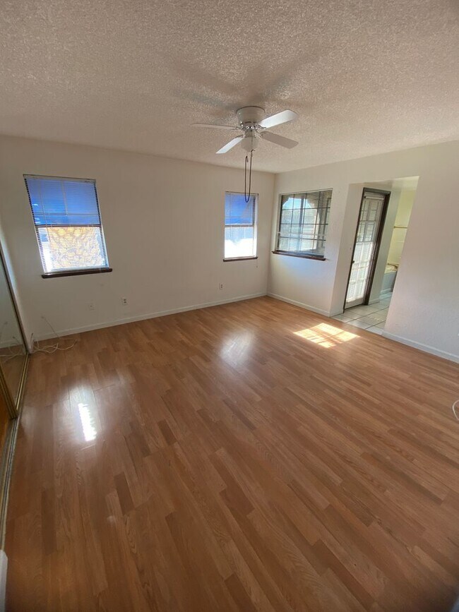 Building Photo - AMERICANA Property Mgmt - Downstairs 2 Bed...