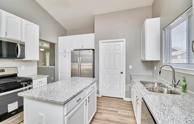 Building Photo - 4927 Triple Tree Ct
