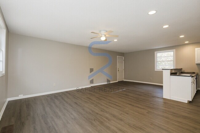 Building Photo - Move in before December 31st and choose your reward: a $250 Amazon Gift Card or a 55" Smart TV!