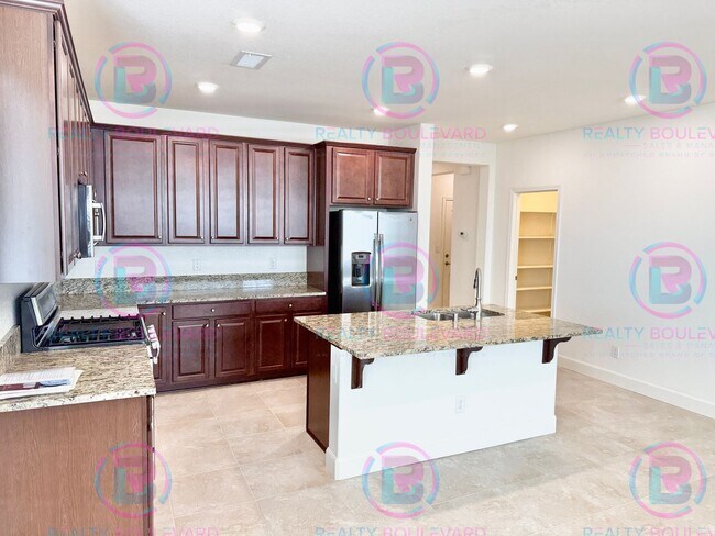 Building Photo - Modern North Valleys 3 Bedroom 2 Bath Home with Gourmet Kitchen, Open Living & Backyard Oasis on ...
