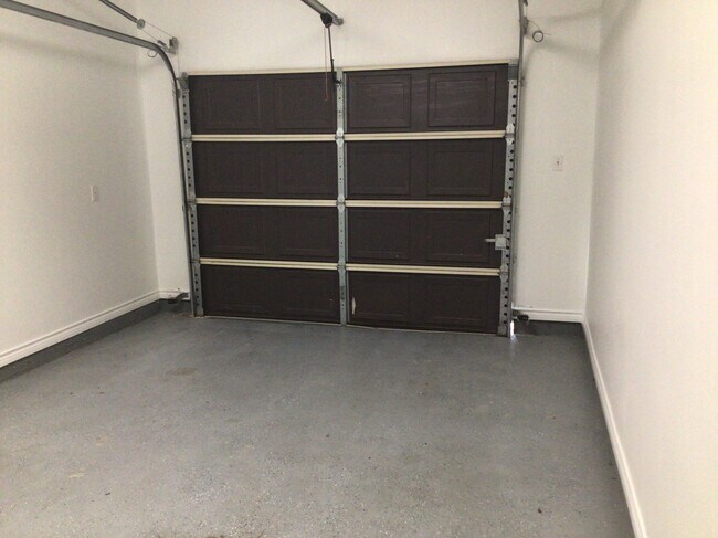 GARAGE WITH ELECTRIC OPENER - 2913 Whisper Oaks Ln