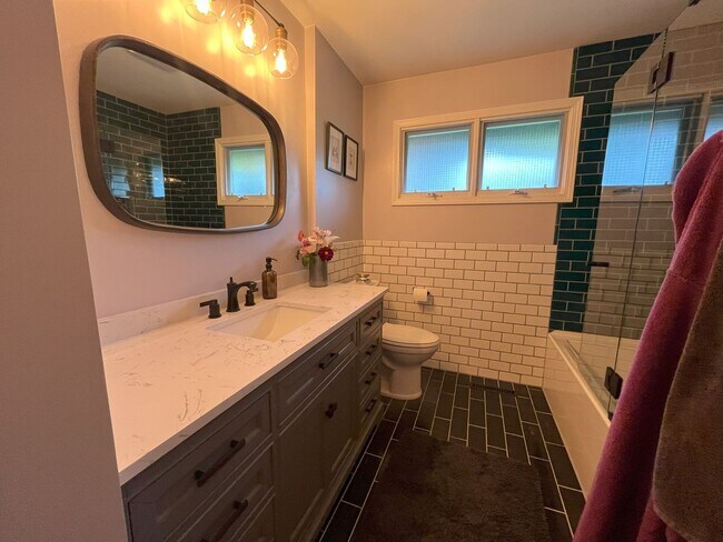 Building Photo - Spacious 4-Bedroom Home with Lush Landscap...
