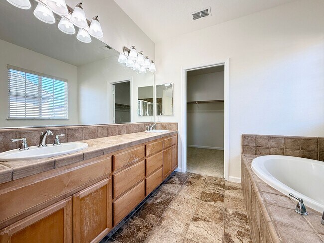 Building Photo - Renovated Coastal Home with NEW Kitchen and a Spacious Layout