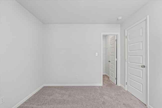 Building Photo - New 3BR Home in Whispering Woods – Modern ...