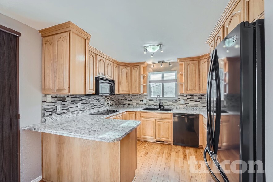 Building Photo - 8495 W 78th Cir