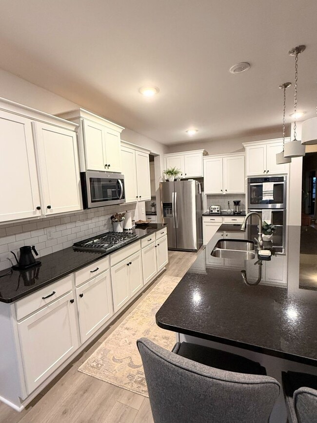 Building Photo - Beautiful 3BR Home with Office on Large .34-Acre Lot-  Spacious Single-Story Living in Stewarts C...