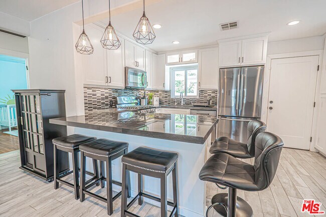 Building Photo - 7044 Garden Grove Ave