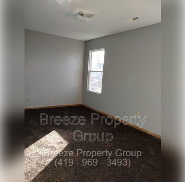 Building Photo - 205 W Chalmers Ave